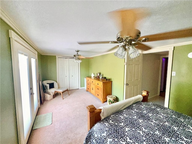 3246 Old Mcclellandtown Rd, Pa, PA 15458 - bedroom with light colored carpet, ornamental molding, a closet, a ceiling fan, and a textured ceiling