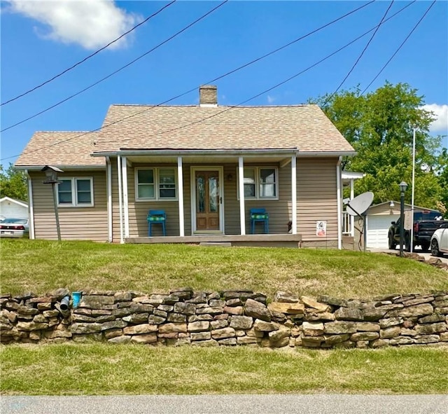 3246 Old Mcclellandtown Rd, Pa, PA 15458 - rear view of property featuring covered porch, a chimney, and a yard