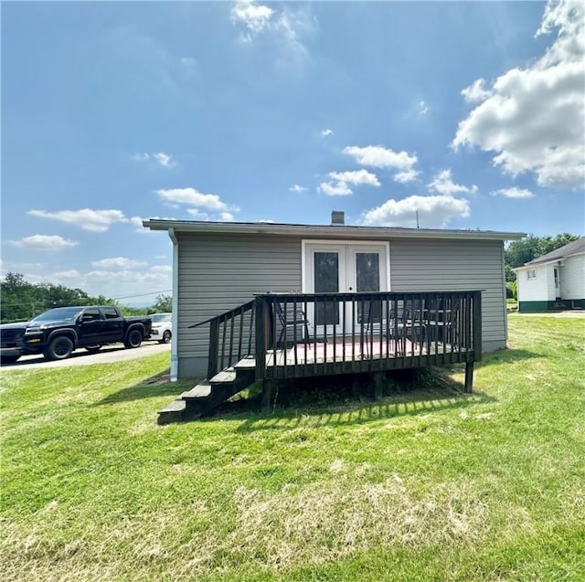 3246 Old Mcclellandtown Rd, Pa, PA 15458 - rear view of property featuring a wooden deck, a lawn, and french doors