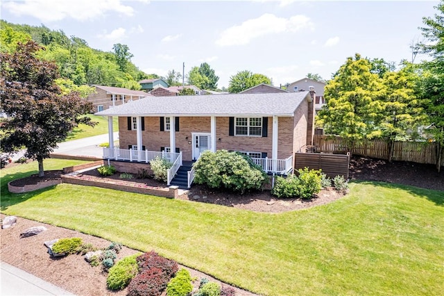 25 Nottingham Dr, Hempfield Twp, PA 15601 - bi-level home with covered porch and brick siding