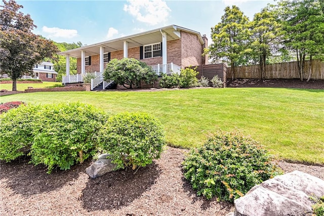 25 Nottingham Dr, Hempfield Twp, PA 15601 - view of front of property with brick siding and a porch
