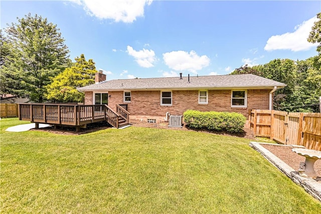 25 Nottingham Dr, Hempfield Twp, PA 15601 - rear view of house featuring brick siding, a deck, and a chimney