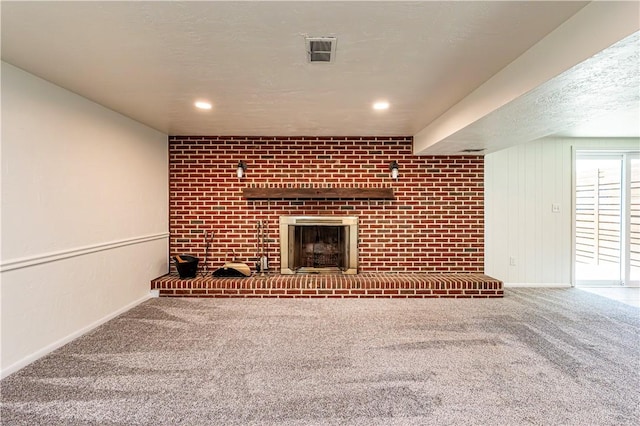 25 Nottingham Dr, Hempfield Twp, PA 15601 - unfurnished living room featuring carpet, a brick fireplace, and recessed lighting