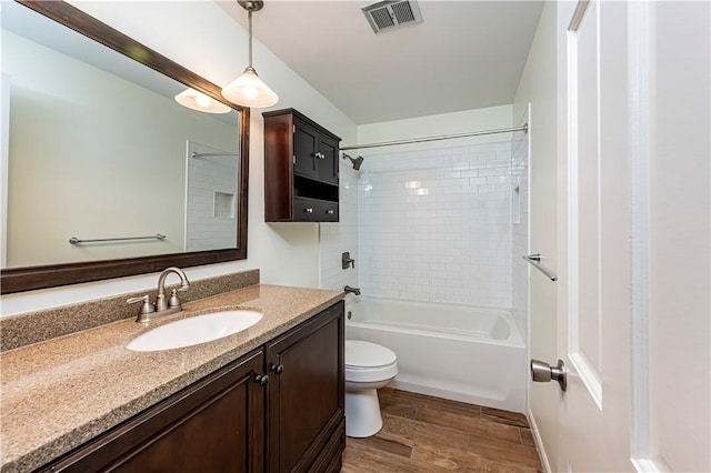 25 Nottingham Dr, Hempfield Twp, PA 15601 - bathroom with vanity, tub / shower combination, and wood finished floors