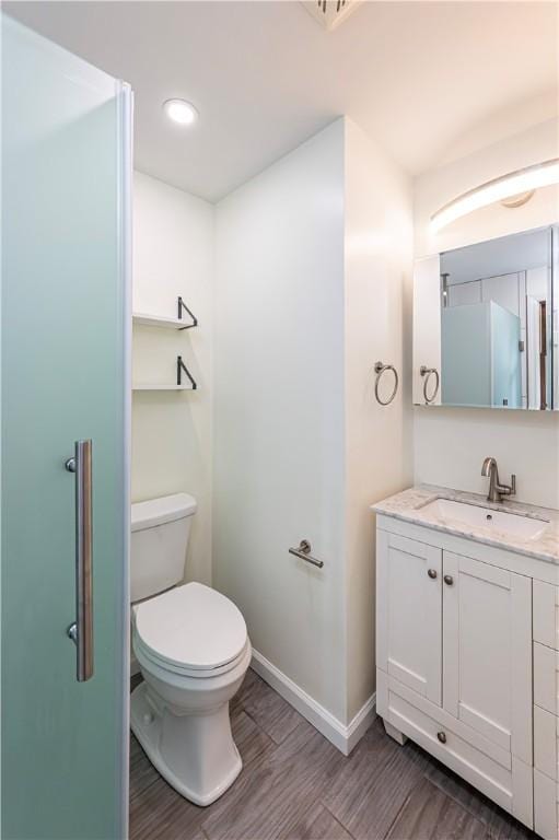 25 Nottingham Dr, Hempfield Twp, PA 15601 - bathroom featuring wood finished floors and vanity