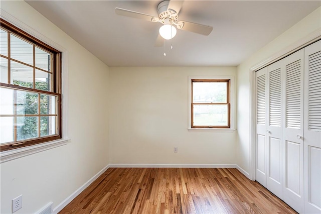 25 Nottingham Dr, Hempfield Twp, PA 15601 - unfurnished bedroom with a closet, light wood finished floors, and ceiling fan