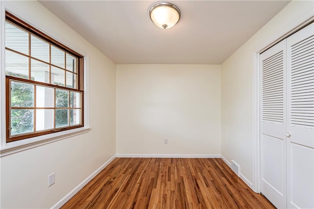 25 Nottingham Dr, Hempfield Twp, PA 15601 - unfurnished bedroom with wood finished floors and a closet