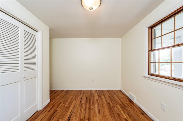 25 Nottingham Dr, Hempfield Twp, PA 15601 - unfurnished bedroom featuring wood finished floors and a closet
