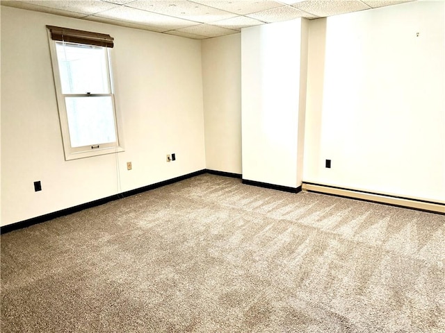 314-316 W Main St, Monongahela, PA 15063 - empty room featuring carpet floors, a paneled ceiling, and a baseboard heating unit