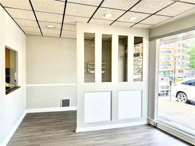 314-316 W Main St, Monongahela, PA 15063 - doorway to outside with wood finished floors and a paneled ceiling
