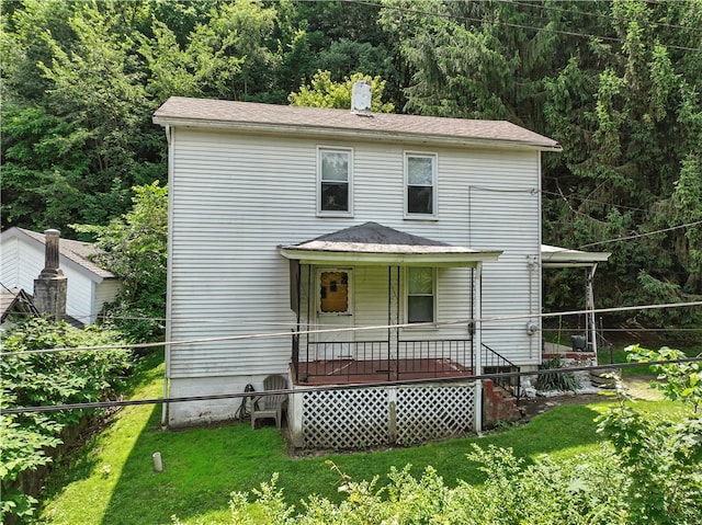 3114 30th St, Pulaski Twp Bea, PA 15066 - rear view of house with covered porch and a view of trees