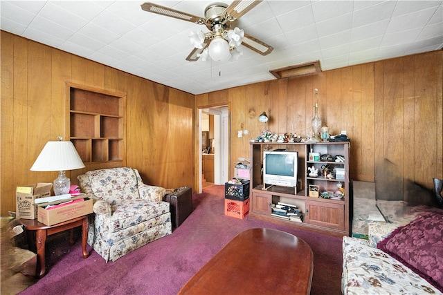 3114 30th St, Pulaski Twp Bea, PA 15066 - carpeted living room featuring wooden walls, ceiling fan, built in features, and attic access