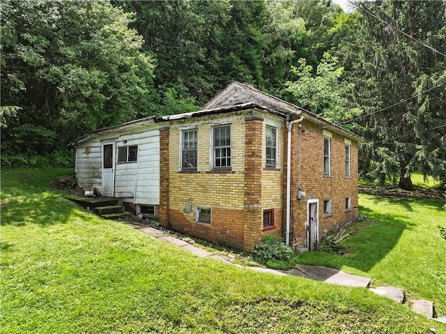 3114 30th St, Pulaski Twp Bea, PA 15066 - view of home's exterior with a yard, brick siding, and a wooded view