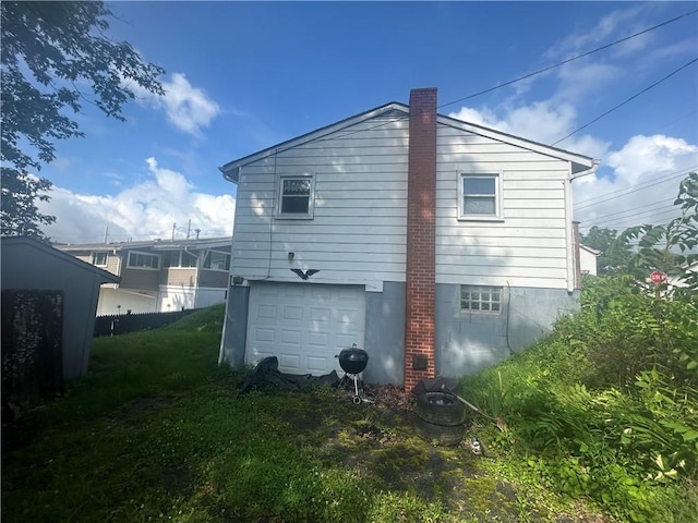 100 Quarry St, Rochester, PA 15074 - back of house with an attached garage