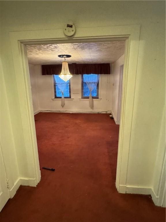 3238 Hardie Way, Oakland, PA 15213 - corridor featuring dark colored carpet and baseboards