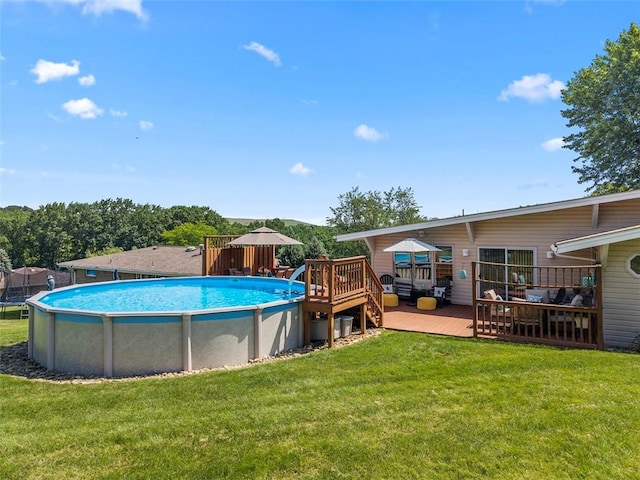 367 Crescent Dr, Canton Twp, PA 15301 - swimming pool with a wooden deck and a lawn