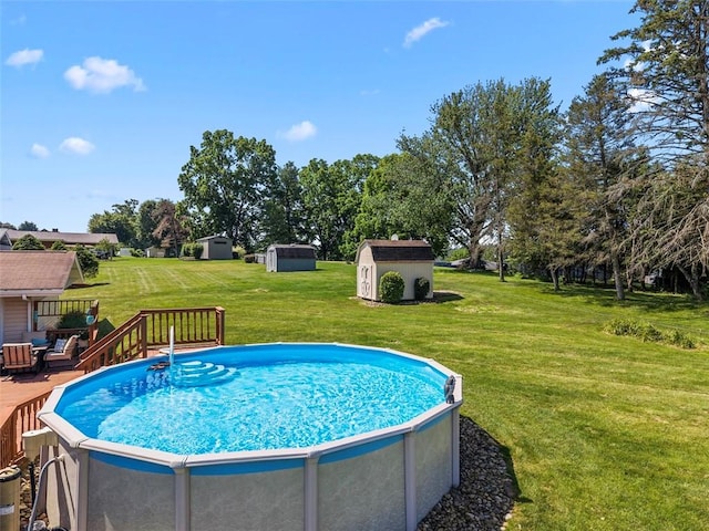 367 Crescent Dr, Canton Twp, PA 15301 - view of pool with a storage unit, a deck, and a lawn