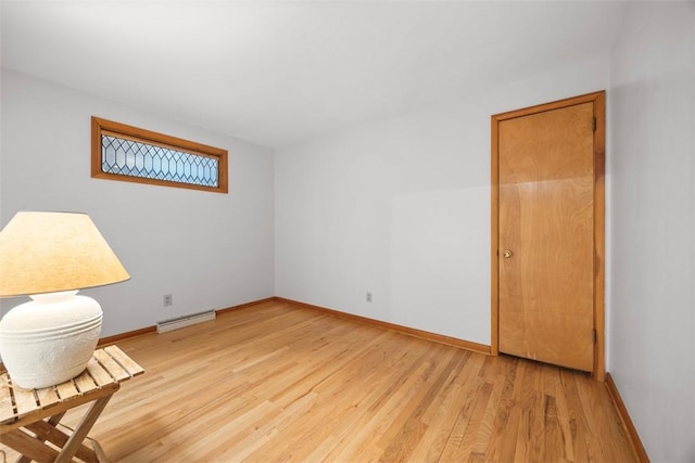 367 Crescent Dr, Canton Twp, PA 15301 - spare room featuring light wood-type flooring and a baseboard heating unit