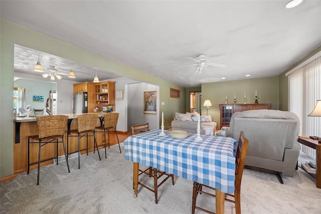 367 Crescent Dr, Canton Twp, PA 15301 - dining space featuring a ceiling fan and light colored carpet