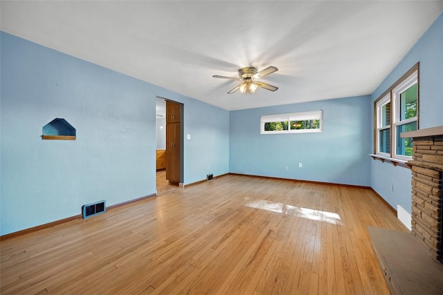 3960 Millers Run Rd, Cecil, PA 15057 - unfurnished living room featuring a ceiling fan and hardwood / wood-style floors