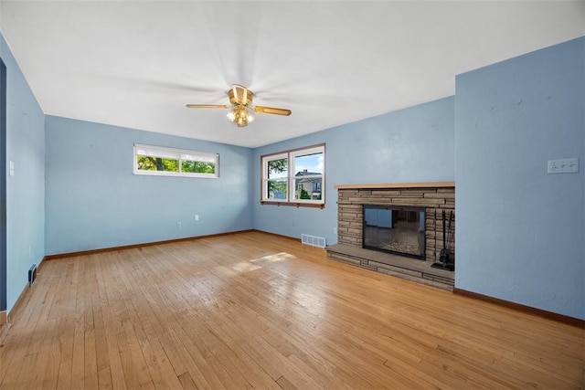 3960 Millers Run Rd, Cecil, PA 15057 - unfurnished living room featuring hardwood / wood-style floors, ceiling fan, and a fireplace