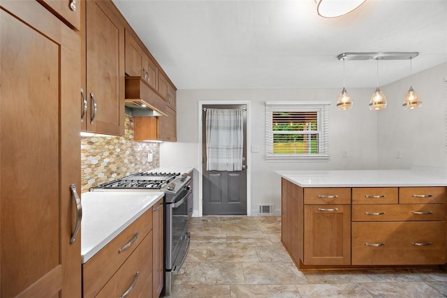 3960 Millers Run Rd, Cecil, PA 15057 - kitchen with stainless steel gas range oven, brown cabinets, backsplash, and light countertops