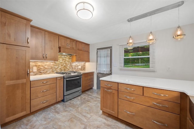 3960 Millers Run Rd, Cecil, PA 15057 - kitchen featuring stainless steel gas range, brown cabinetry, under cabinet range hood, light countertops, and decorative backsplash