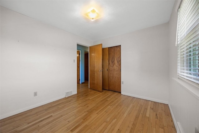 3960 Millers Run Rd, Cecil, PA 15057 - unfurnished bedroom with light wood finished floors and a closet