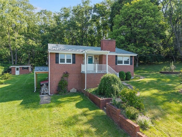 3960 Millers Run Rd, Cecil, PA 15057 - view of front of property featuring brick siding, a porch, a front yard, a chimney, and a metal roof