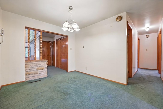 14 Denamen B Dr, West Middlesex Boro, PA 16159 - carpeted empty room with a chandelier and a smoke detector