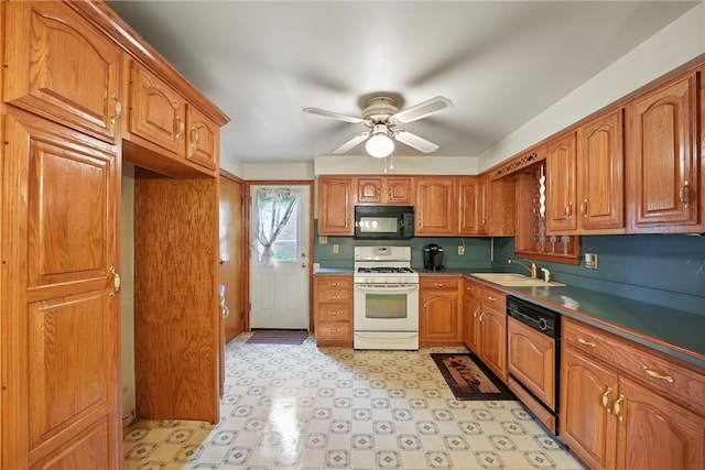 14 Denamen B Dr, West Middlesex Boro, PA 16159 - kitchen with black microwave, gas range gas stove, dishwasher, a ceiling fan, and brown cabinets