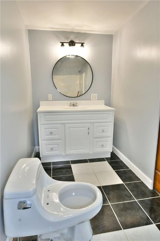 49 N Oakdale Ave, Hermitage, PA 16148 - bathroom with vanity and tile patterned flooring