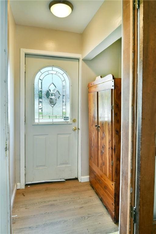 49 N Oakdale Ave, Hermitage, PA 16148 - doorway featuring light wood-style flooring and baseboards