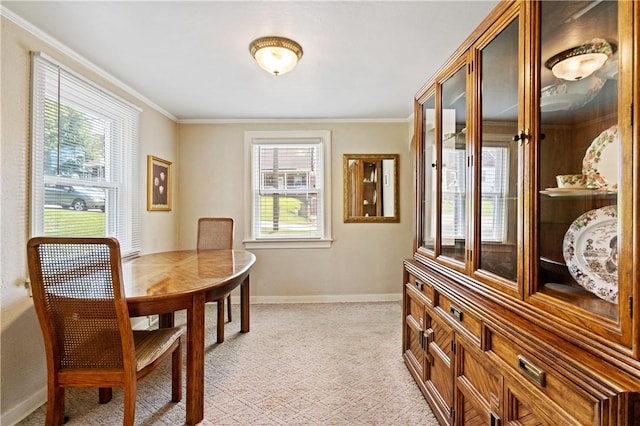 2534 Jefferson Ave, West Mifflin, PA 15122 - dining area featuring crown molding and light carpet