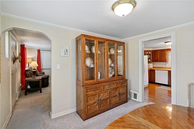 2534 Jefferson Ave, West Mifflin, PA 15122 - hall with arched walkways, light carpet, and crown molding