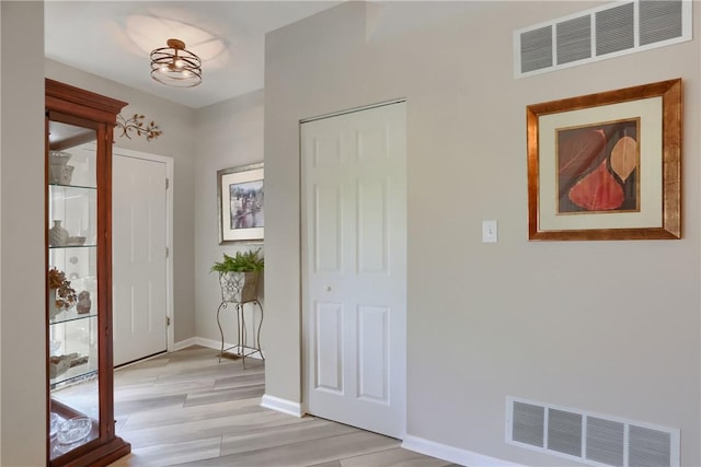 135 Linden Ct, Seven Fields Boro, PA 16046 - entrance foyer with light wood-style floors and baseboards