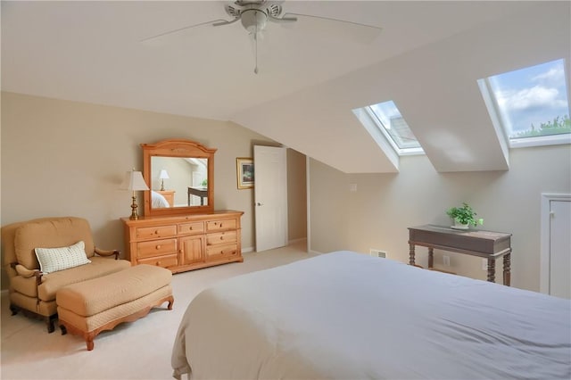 135 Linden Ct, Seven Fields Boro, PA 16046 - bedroom featuring a skylight, lofted ceiling, light carpet, and a ceiling fan