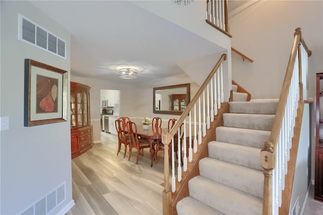 135 Linden Ct, Seven Fields Boro, PA 16046 - staircase featuring wood finished floors
