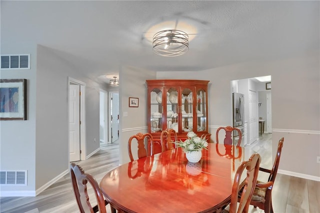 135 Linden Ct, Seven Fields Boro, PA 16046 - dining area featuring light wood-style flooring