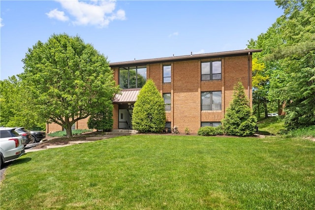 200 Commerce Dr Unit 210, Moon/Crescent Twp, PA 15108 - view of front facade with a front yard and brick siding