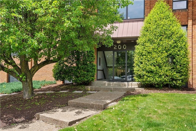 200 Commerce Dr Unit 210, Moon/Crescent Twp, PA 15108 - doorway to property with a yard and brick siding