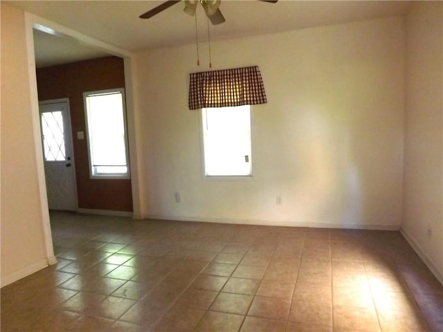 71 Watkins Ave, Donora, PA 15033 - tiled empty room with ceiling fan and plenty of natural light
