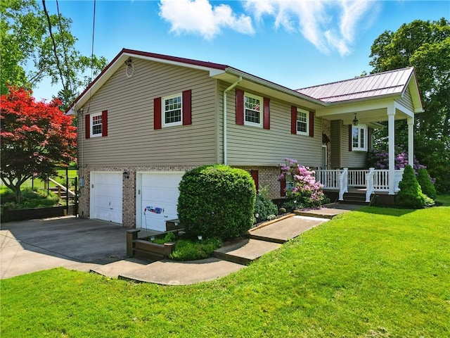 236 Fredonia Rd, Hempfield Twp Mer, PA 16125 - view of front of property with concrete driveway, a garage, a porch, a front yard, and brick siding