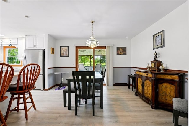 236 Fredonia Rd, Hempfield Twp Mer, PA 16125 - dining space with healthy amount of natural light, light wood finished floors, and a chandelier