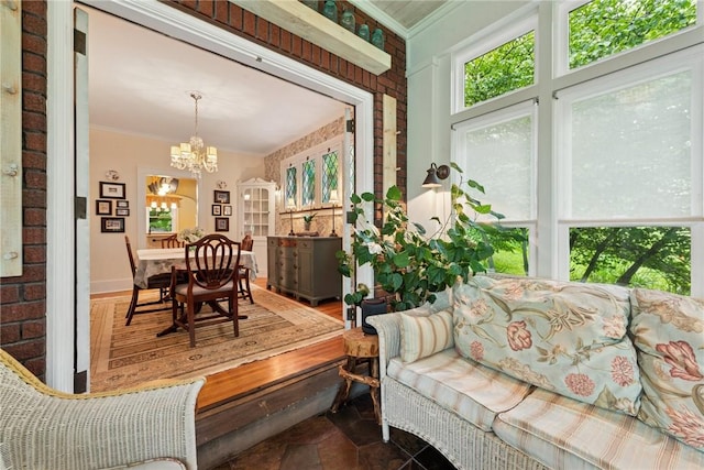 35 Pleasant Valley Rd, Hempfield Twp Wml, PA 15644 - sunroom featuring a chandelier