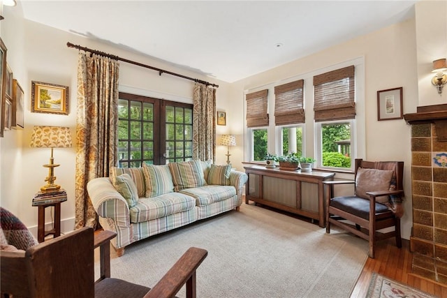 35 Pleasant Valley Rd, Hempfield Twp Wml, PA 15644 - living area with plenty of natural light, french doors, and wood finished floors