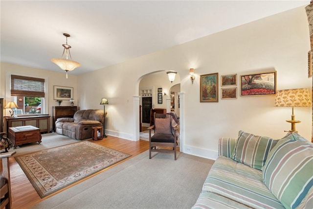 35 Pleasant Valley Rd, Hempfield Twp Wml, PA 15644 - living room featuring arched walkways and wood finished floors