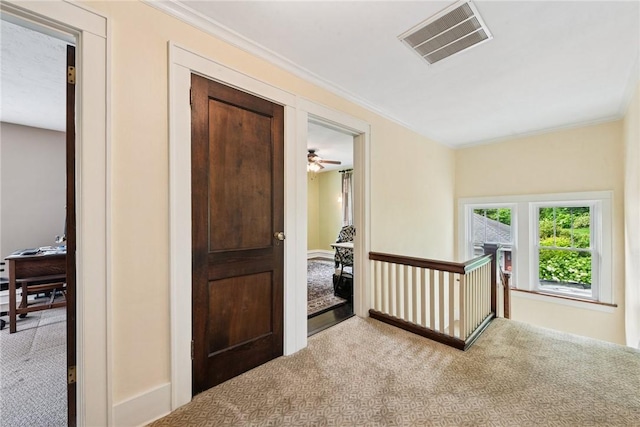 35 Pleasant Valley Rd, Hempfield Twp Wml, PA 15644 - corridor featuring carpet floors, crown molding, and an upstairs landing