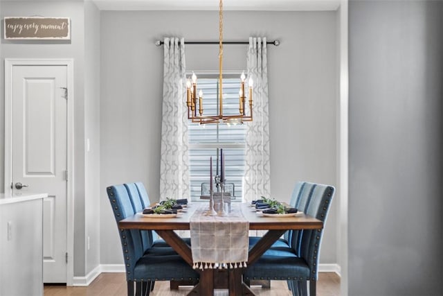 134 Black Oak Ln, Cecil, PA 15057 - dining space with a chandelier and wood finished floors