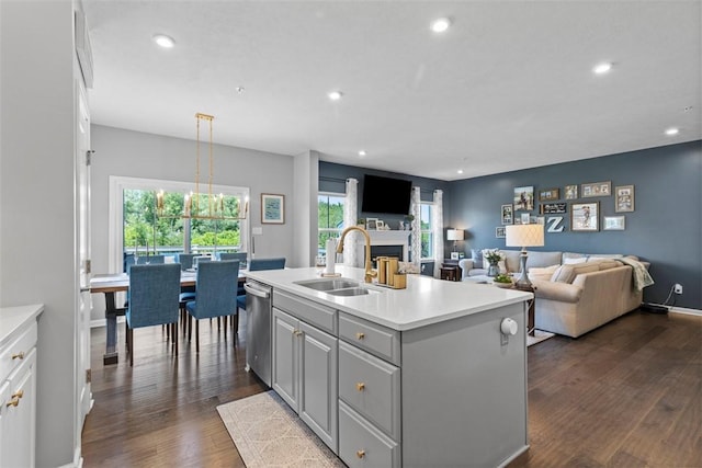 134 Black Oak Ln, Cecil, PA 15057 - kitchen with gray cabinets, dark wood-style floors, light countertops, a fireplace, and recessed lighting